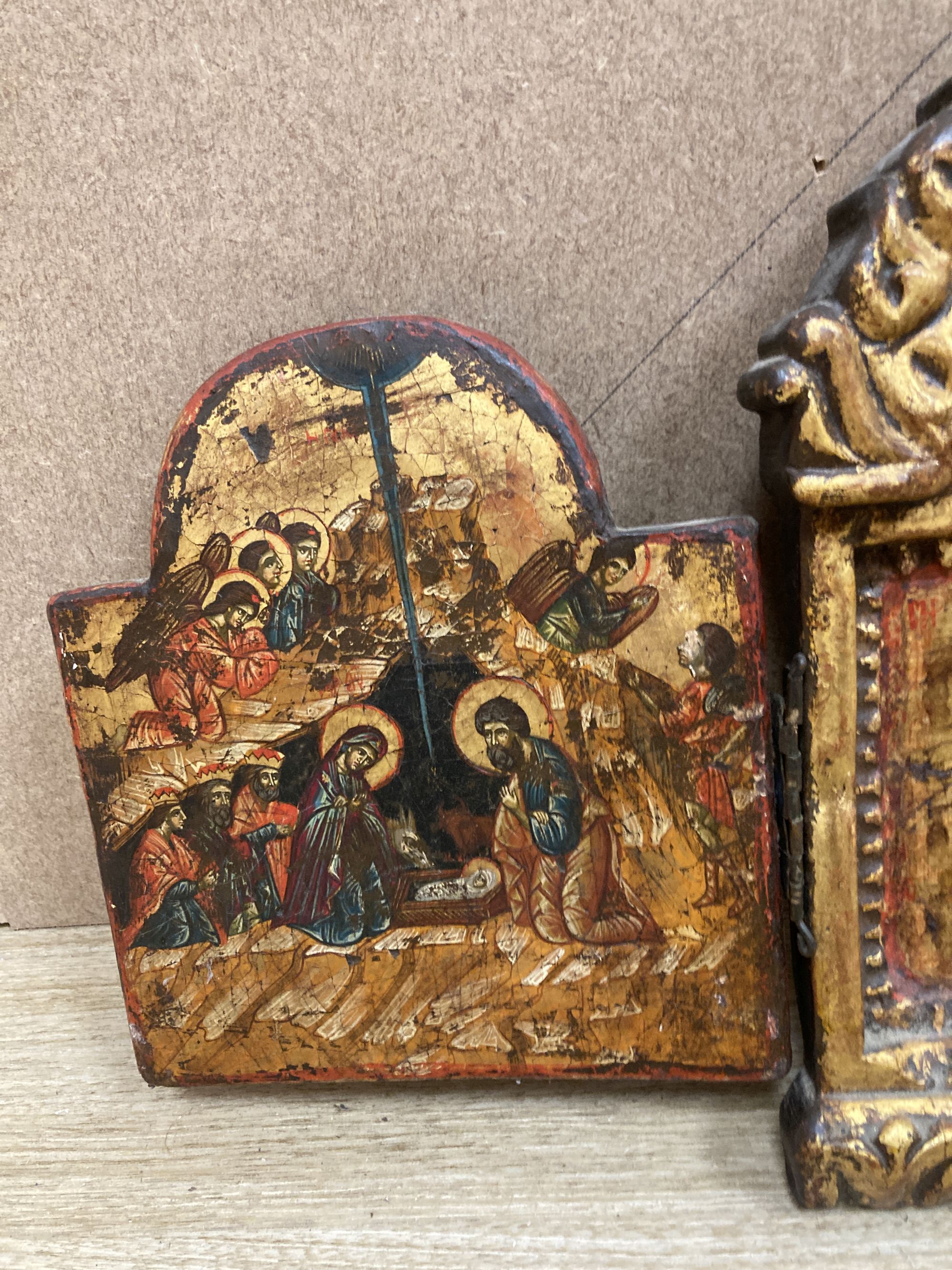 A tempera on wood triptych icon, height overall 25cm and a single Virgin and child icon, 21 x 17cm